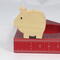 Handmade wooden pig toy, sustainable wood, scroll saw cut, sanded smooth. 1.75", 2", or 2.5" sizes, natural finish for stacking or play.
